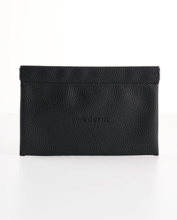 Kleine schwarze Kosmetiktasche mit Magnetverschluss