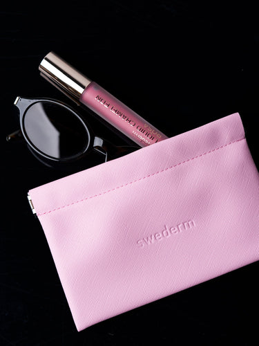 Kleine rosa Kosmetiktasche mit Magnetverschluss