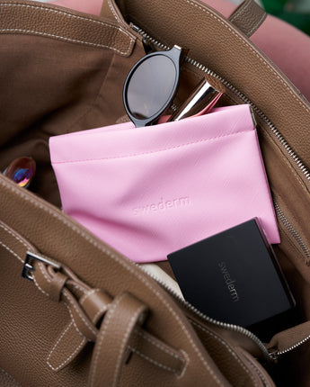 Kleine rosa Kosmetiktasche mit Magnetverschluss